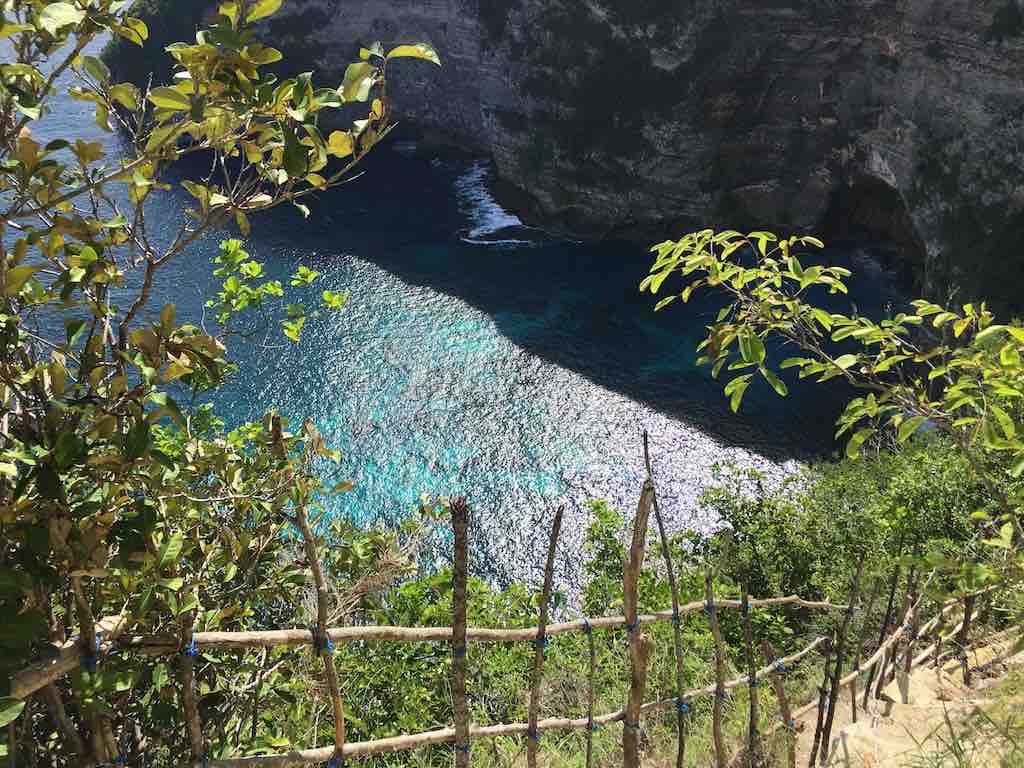 Going down Seganing Waterfall Nusa Penida Bali
